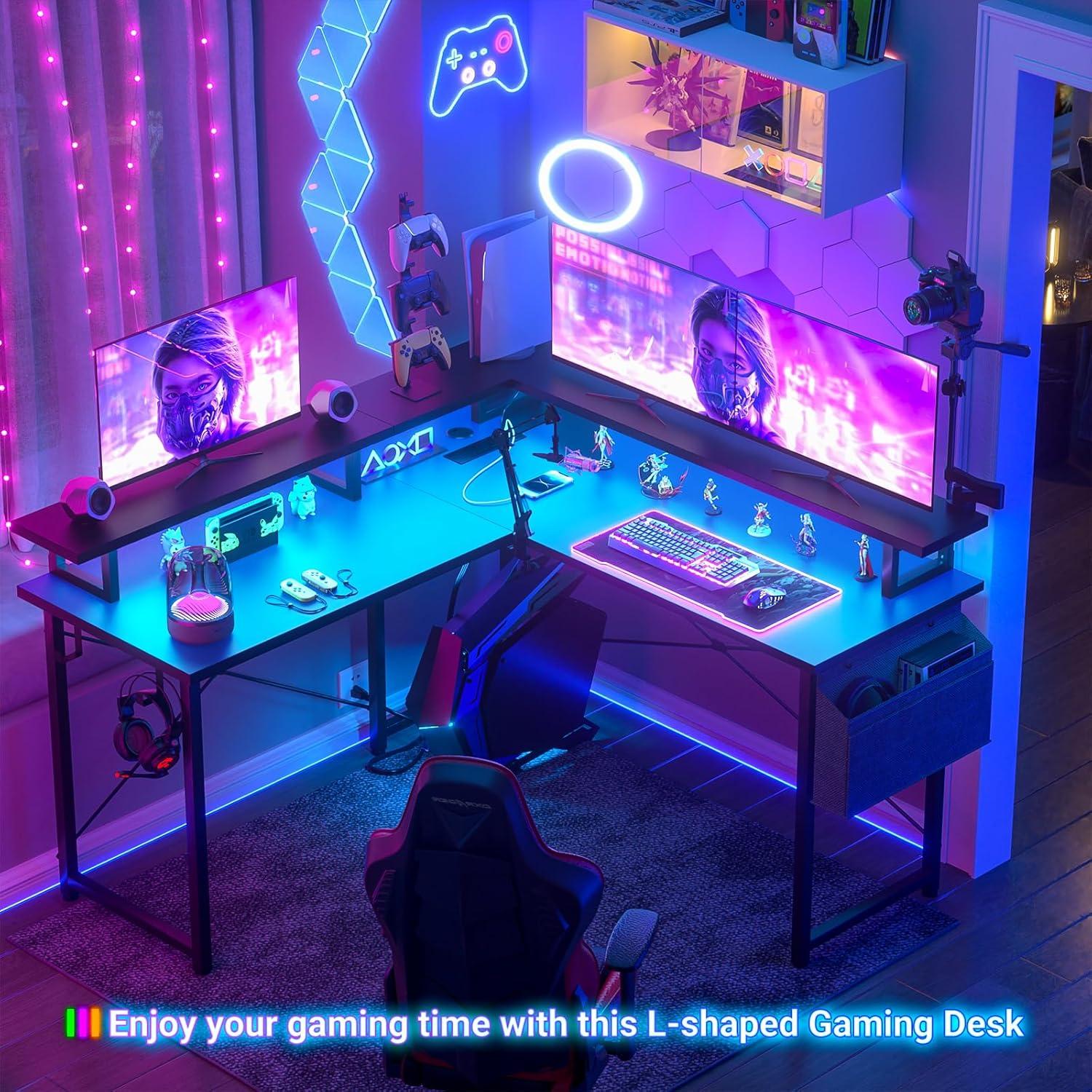 Black L-Shaped Gaming Desk with Power Outlets and Storage