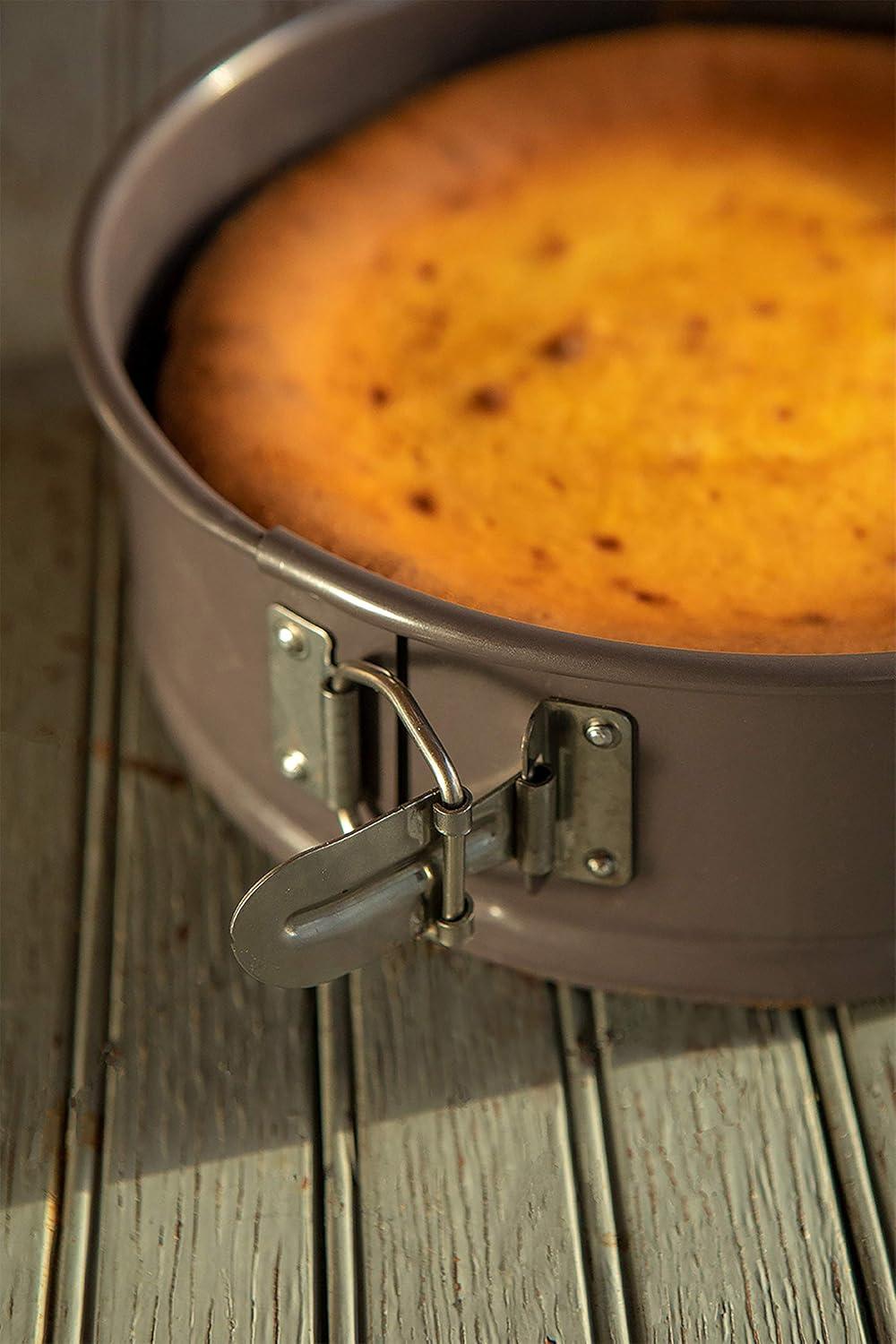 NutriChef 9 Inch Nonstick Cheesecake Springform Cake Pan | Stainless Steel Clasp & Removable Bottom | Durable Carbon Steel Cheesecake Pan | Easy to Clean | Includes 100 Parchment Papers | Black