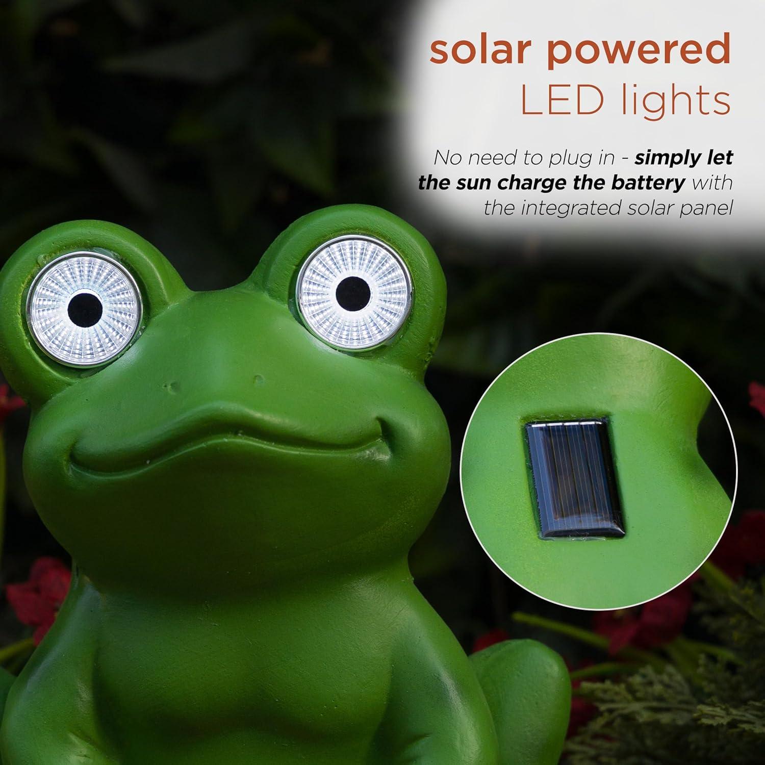Solar Frog Sitting On Top of Mushroom Statue