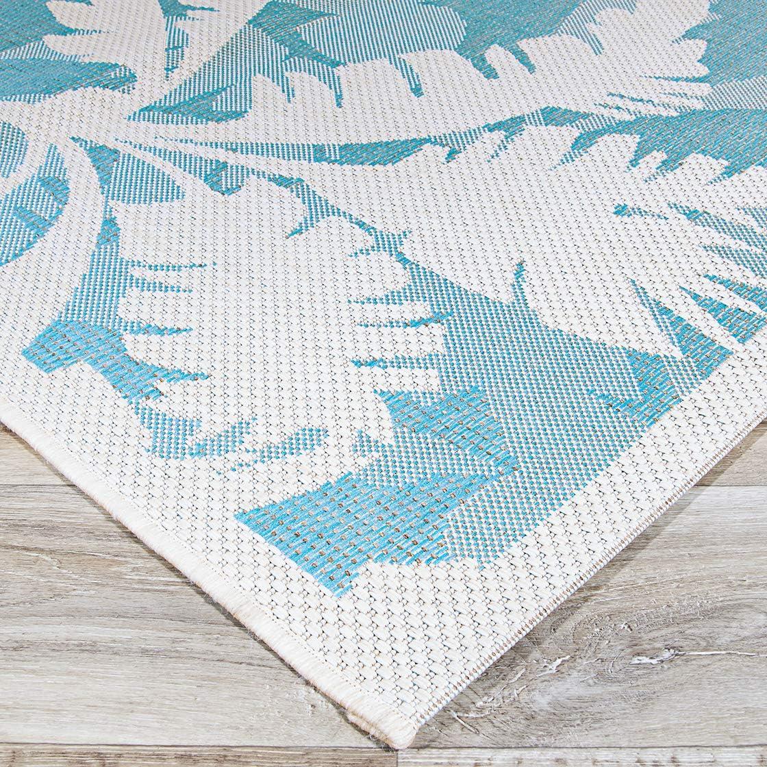 Ivory and Turquoise Synthetic Flat Woven Reversible Area Rug