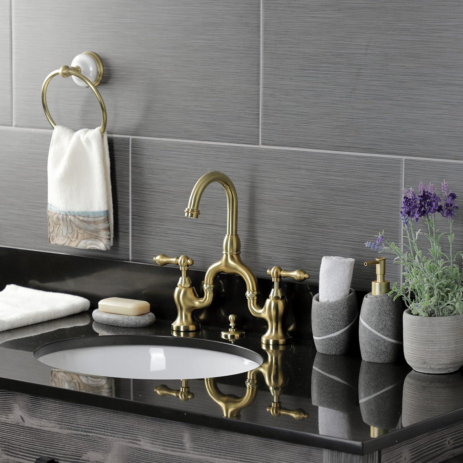 Kingston Brass English Country Two-Handle 3-Hole Deck Mount Bridge Bathroom Faucet with Brass Pop-Up
