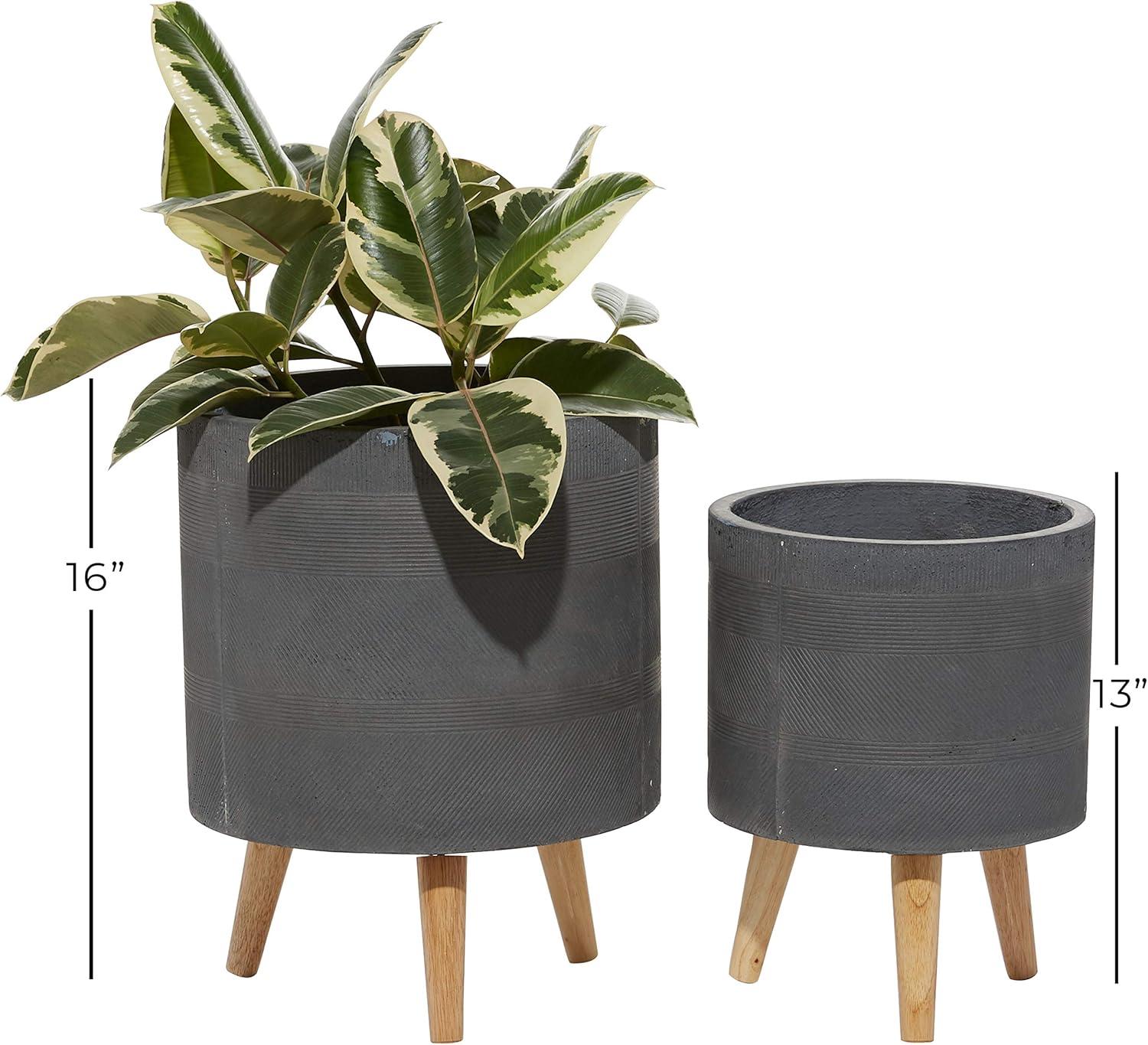 DecMode 13", 16"H Indoor Outdoor Gray Ceramic Planter with Wood Legs (2 Count)