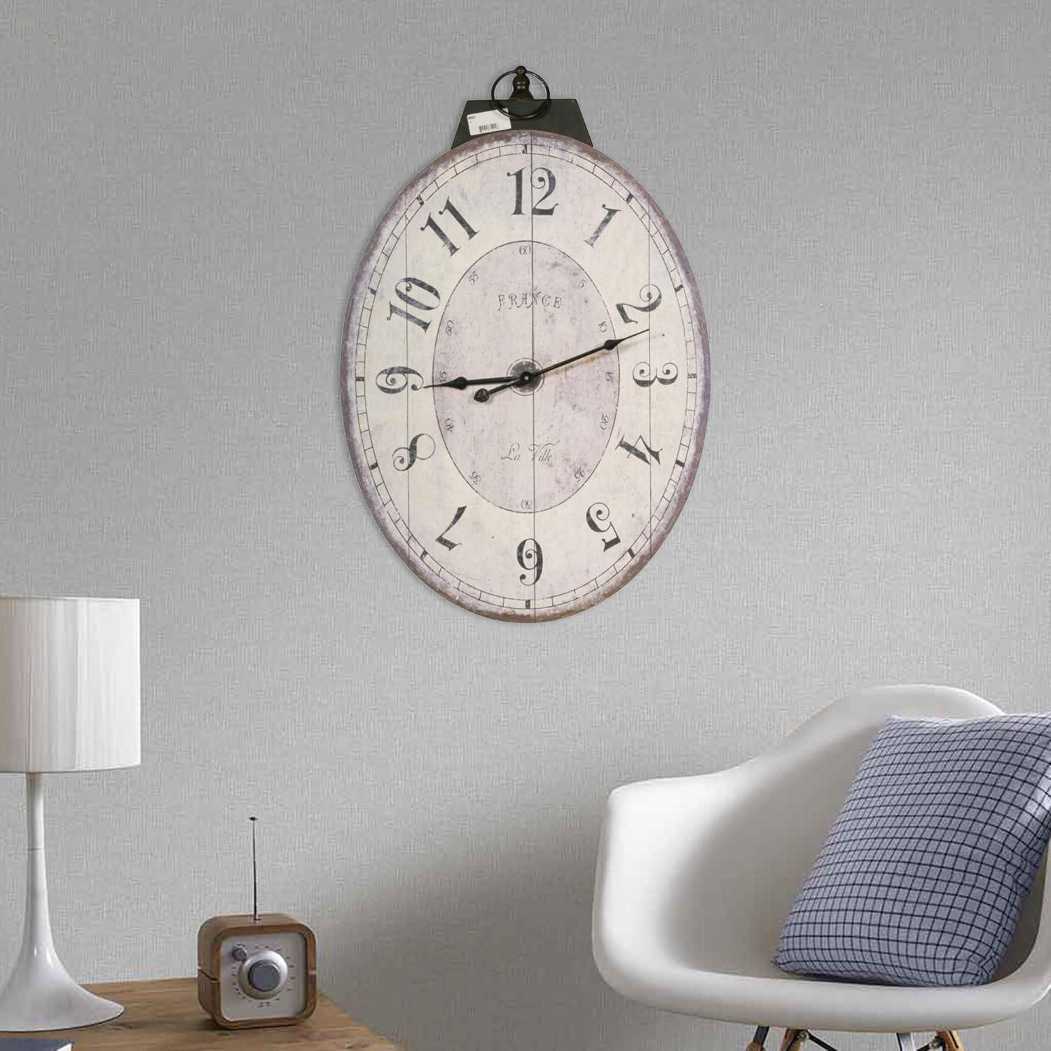 Distressed White and Brown Oval Wooden Wall Clock with Metal Loop
