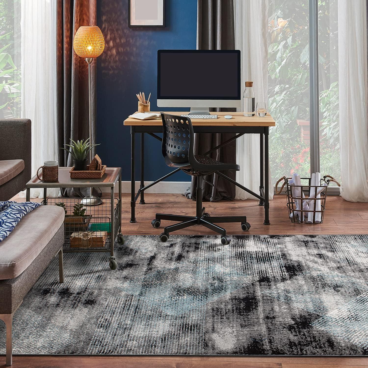 Reversible Geometric Black Synthetic 5' x 7' Area Rug