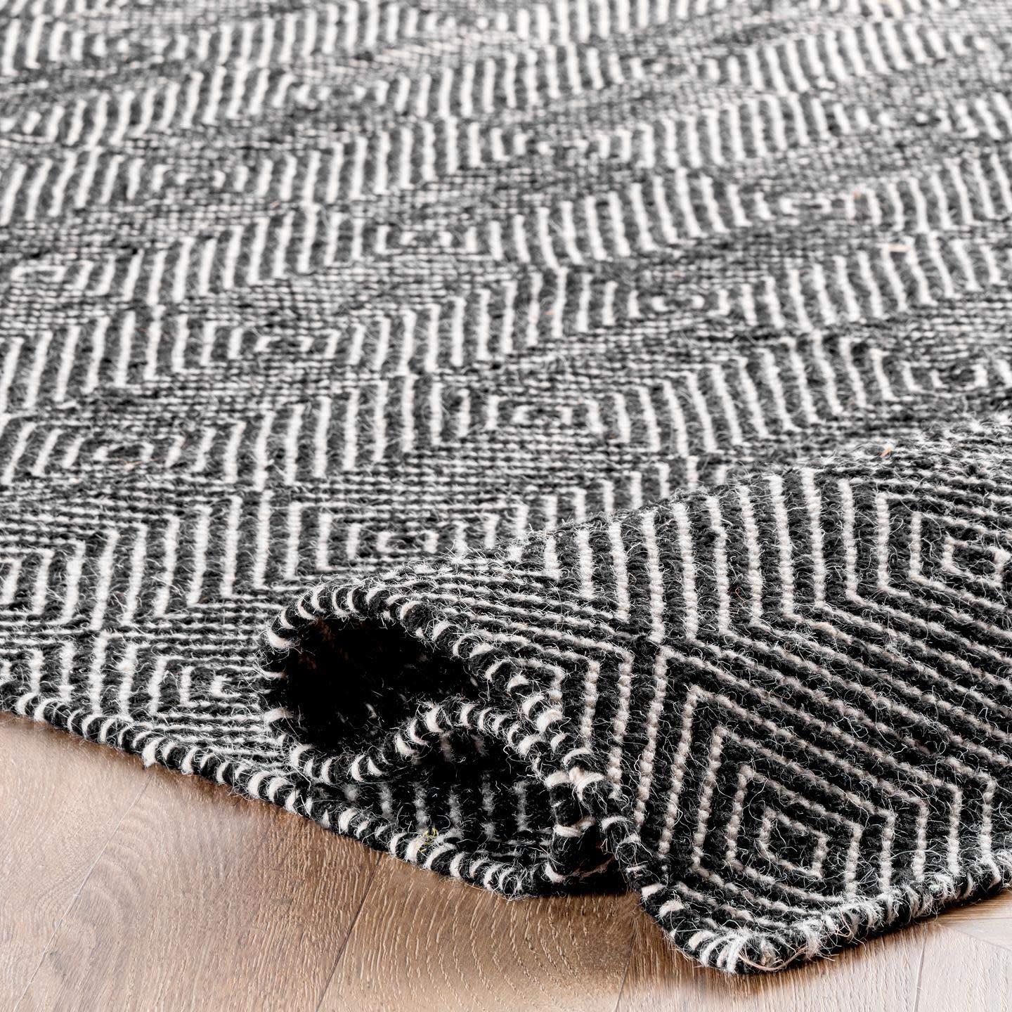 Handmade Geometric Black Wool 9' x 12' Area Rug