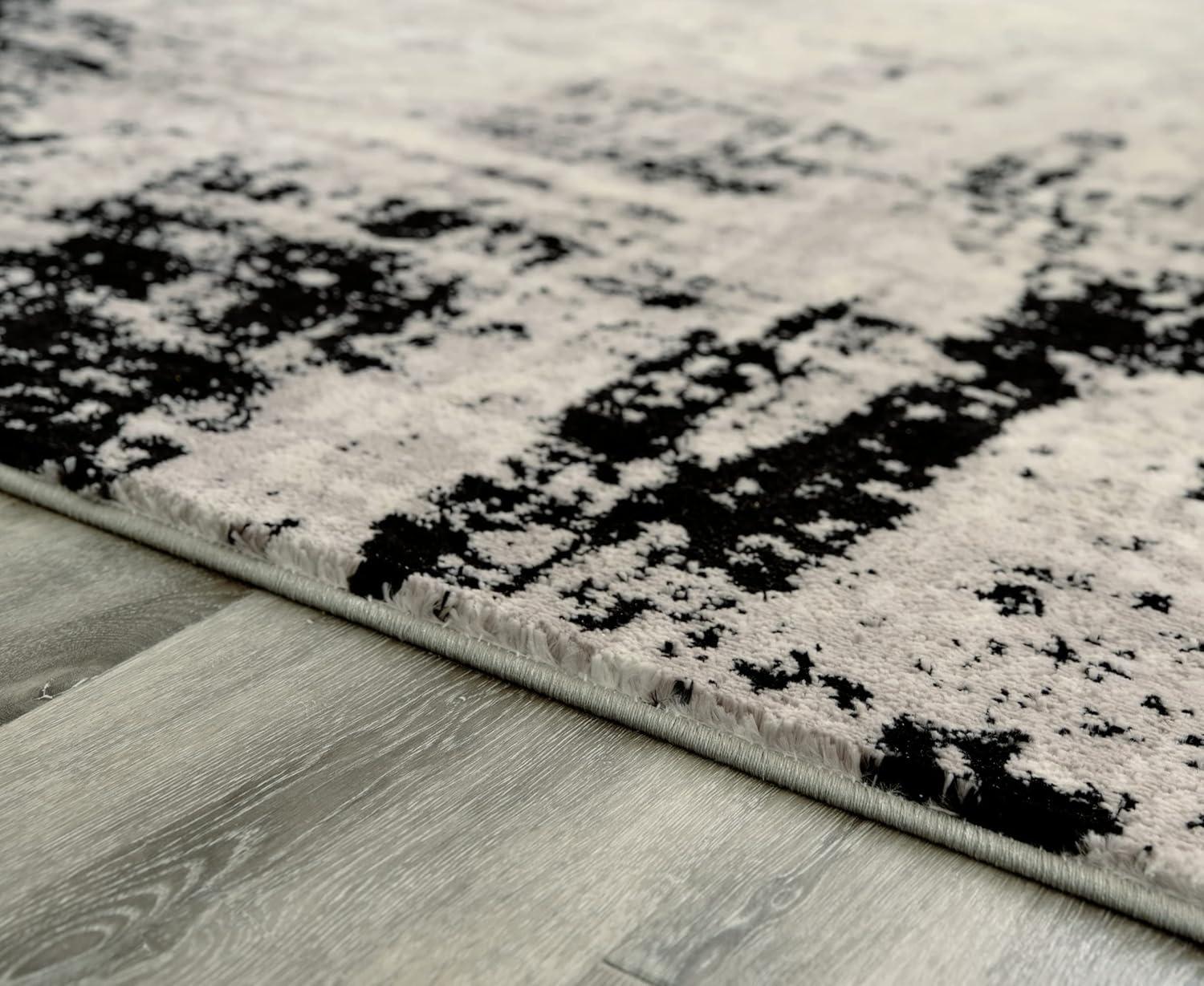 Signature Design by Ashley Contemporary Zekeman 5'3" x 7'7" Rug Black/Cream/Gray