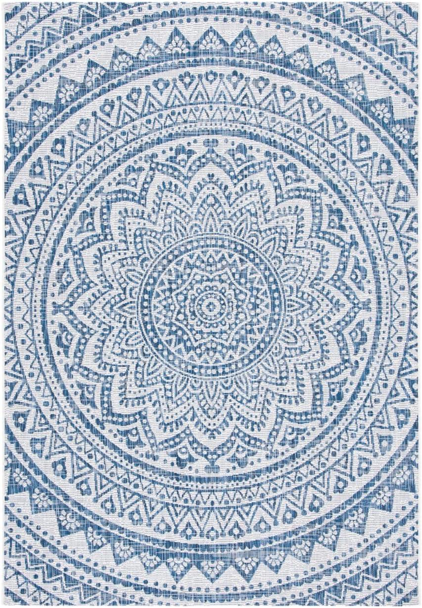 Ivory and Navy Geometric Round Synthetic Area Rug