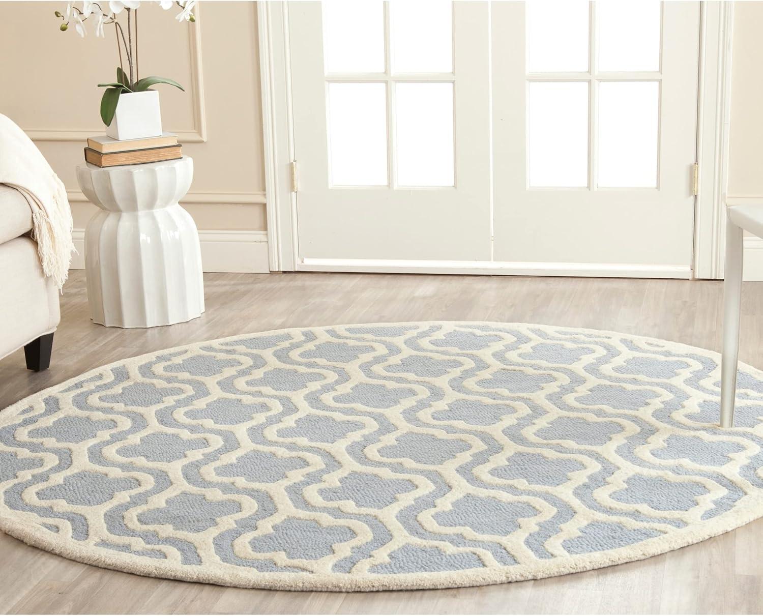 Hand-Tufted Wool Elegance Round Rug in Light Blue/Ivory, 2' x 3'