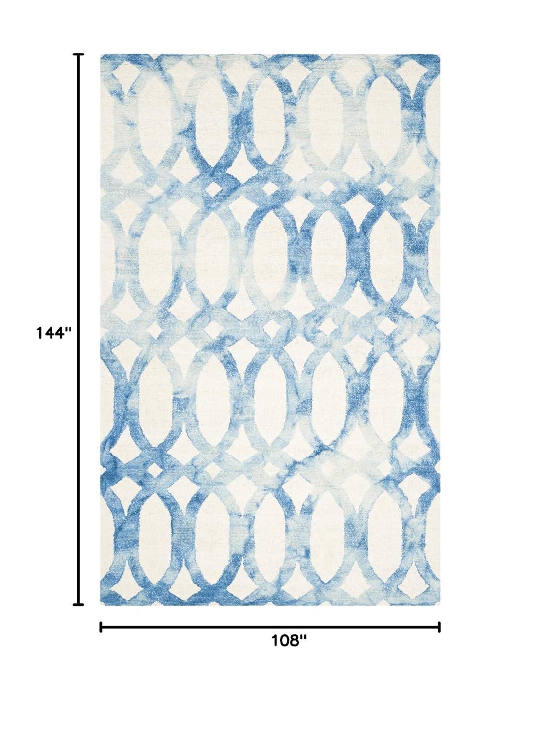 Amekia Hand Tufted Wool/Cotton Geometric Rug in Blue/Ivory