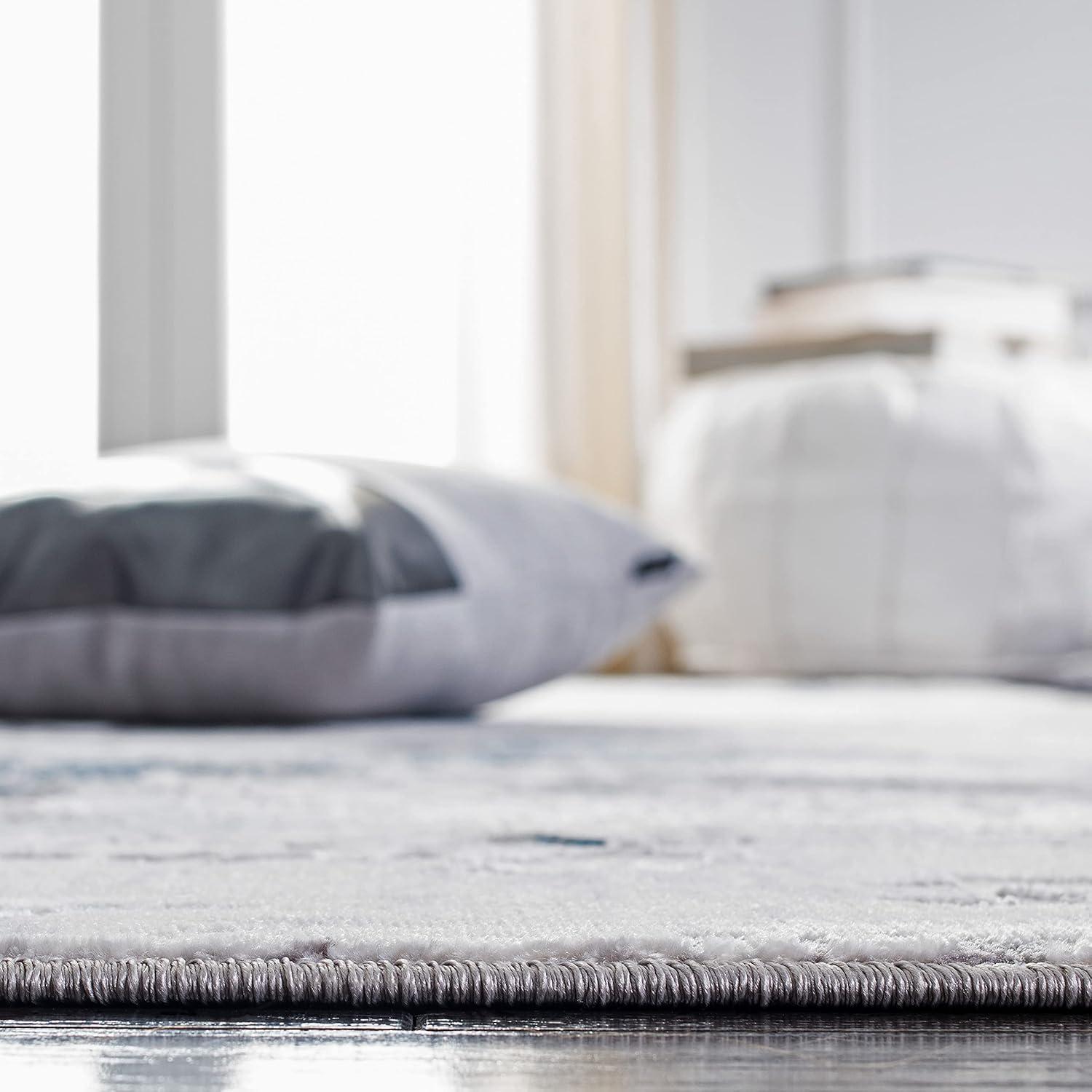 Trent Austin Design® Mcelwain Abstract Gray/Blue Area Rug