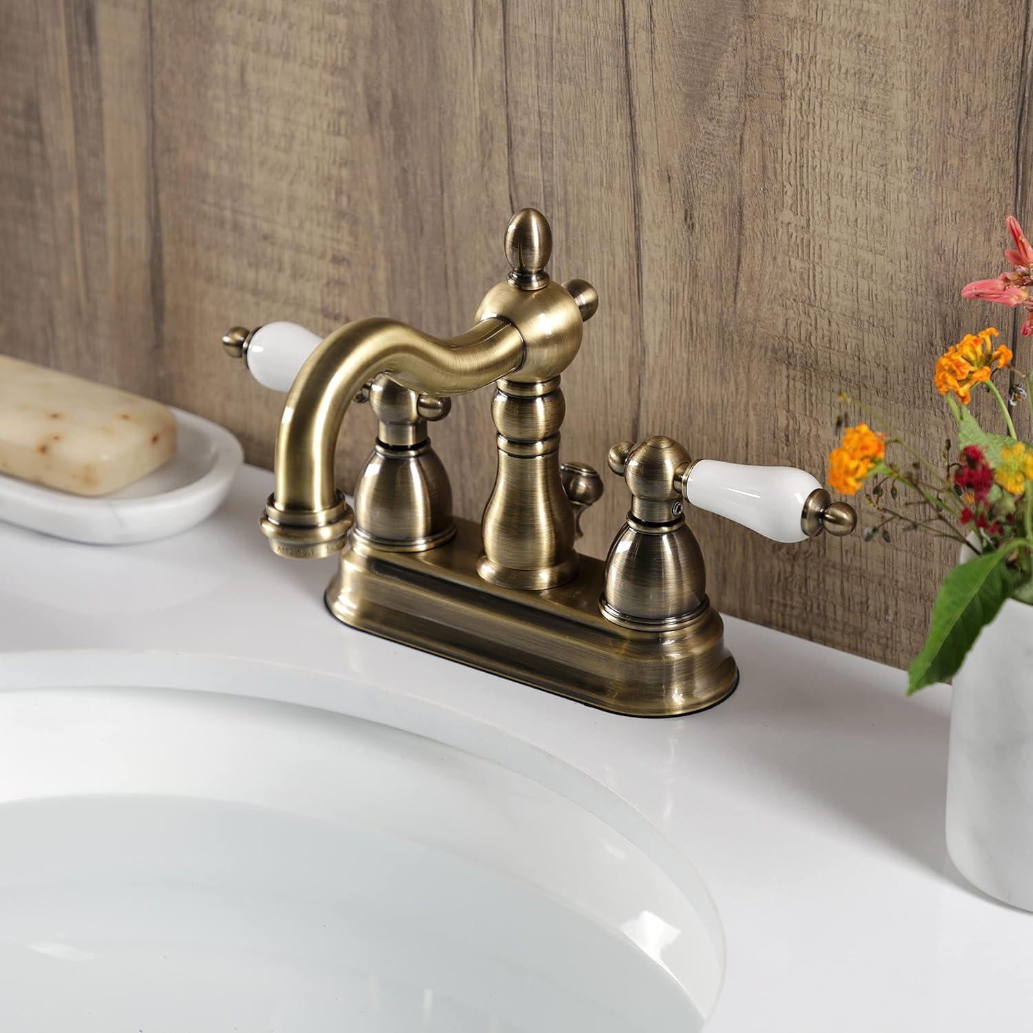 Kingston Brass Heritage Two-Handle 3-Hole Deck Mount 4" Centerset Bathroom Faucet with Plastic Pop-Up