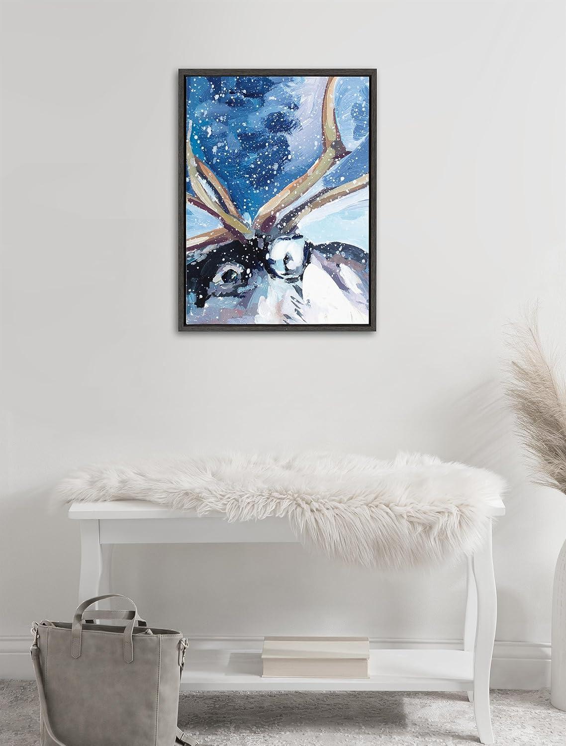 Kate & Laurel All Things Decor Sylvie Colorful Majestic Reindeer In Snow Framed Canvas Wall Art by Rachel Christopoulos