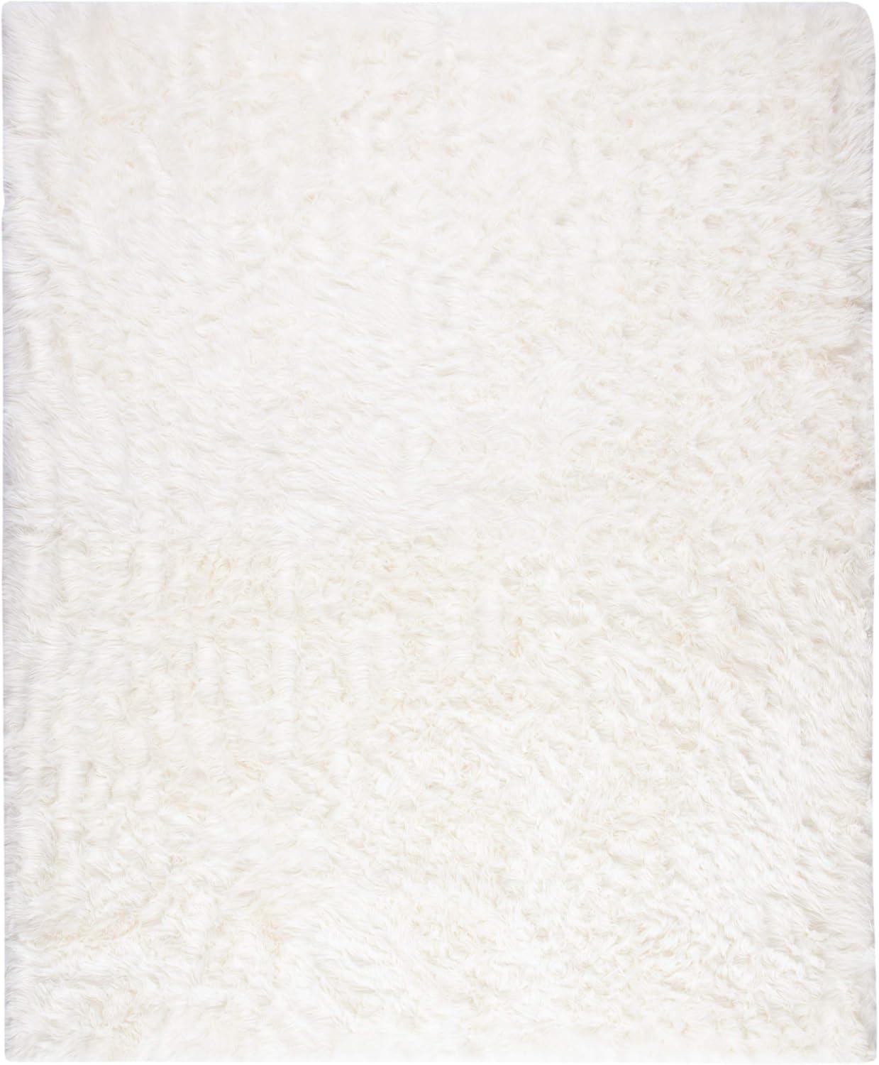 SAFAVIEH Faux Sheep Skin Vesna Solid Plush Area Rug, Ivory, 8' x 10'