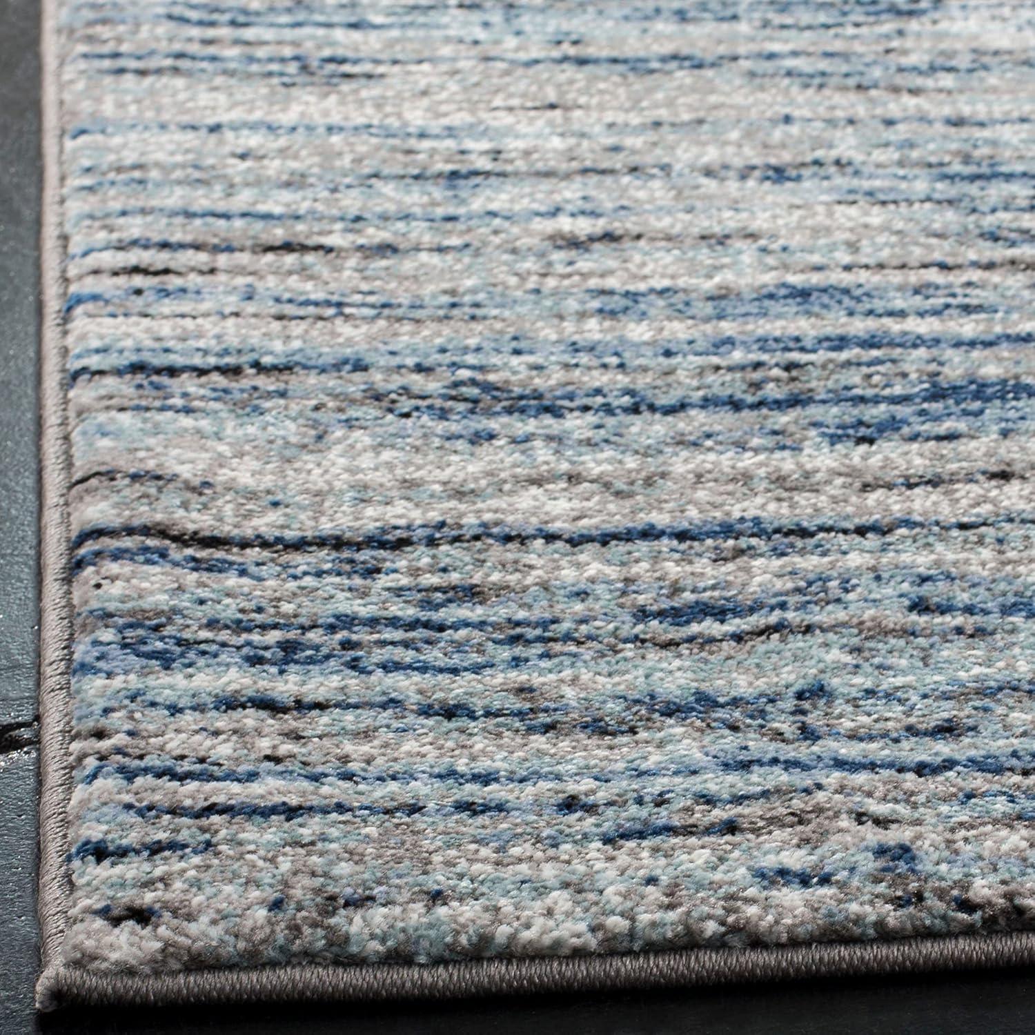 Celestial Blue-Grey Abstract 6'7" x 9' Synthetic Area Rug