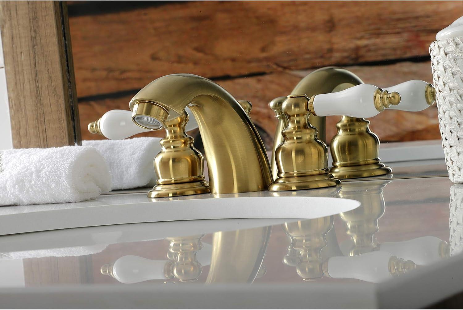 Kingston Brass Victorian Two-Handle 3-Hole Deck Mount Mini-Widespread Bathroom Faucet with Plastic Pop-Up