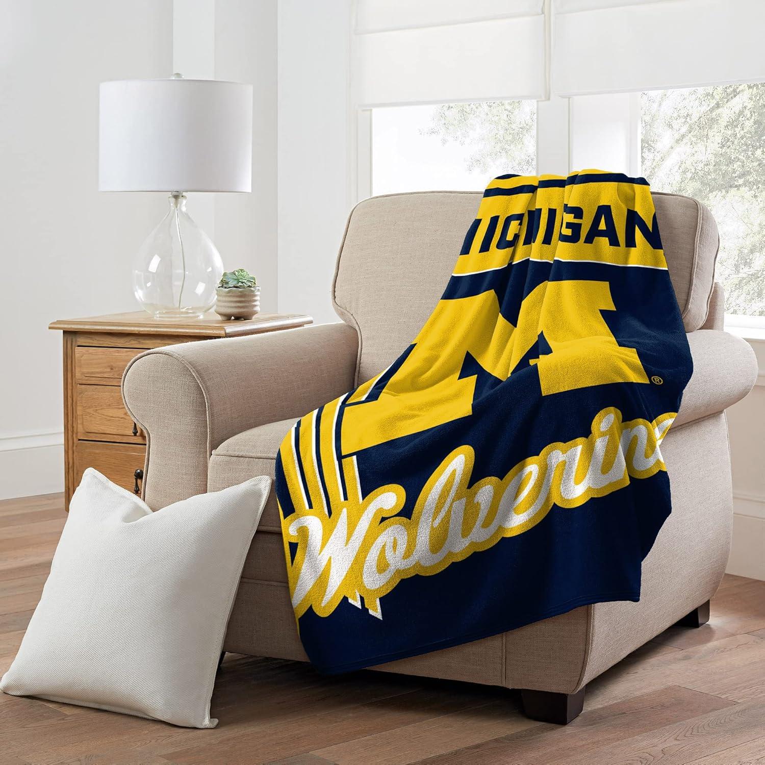 Michigan Wolverines 46" x 60" NCAA Officially Licensed Throw Blanket – Super Soft Lightweight Fleece Blanket for Game Day, Dorms, Couch, Travel & Tailgating Comfort