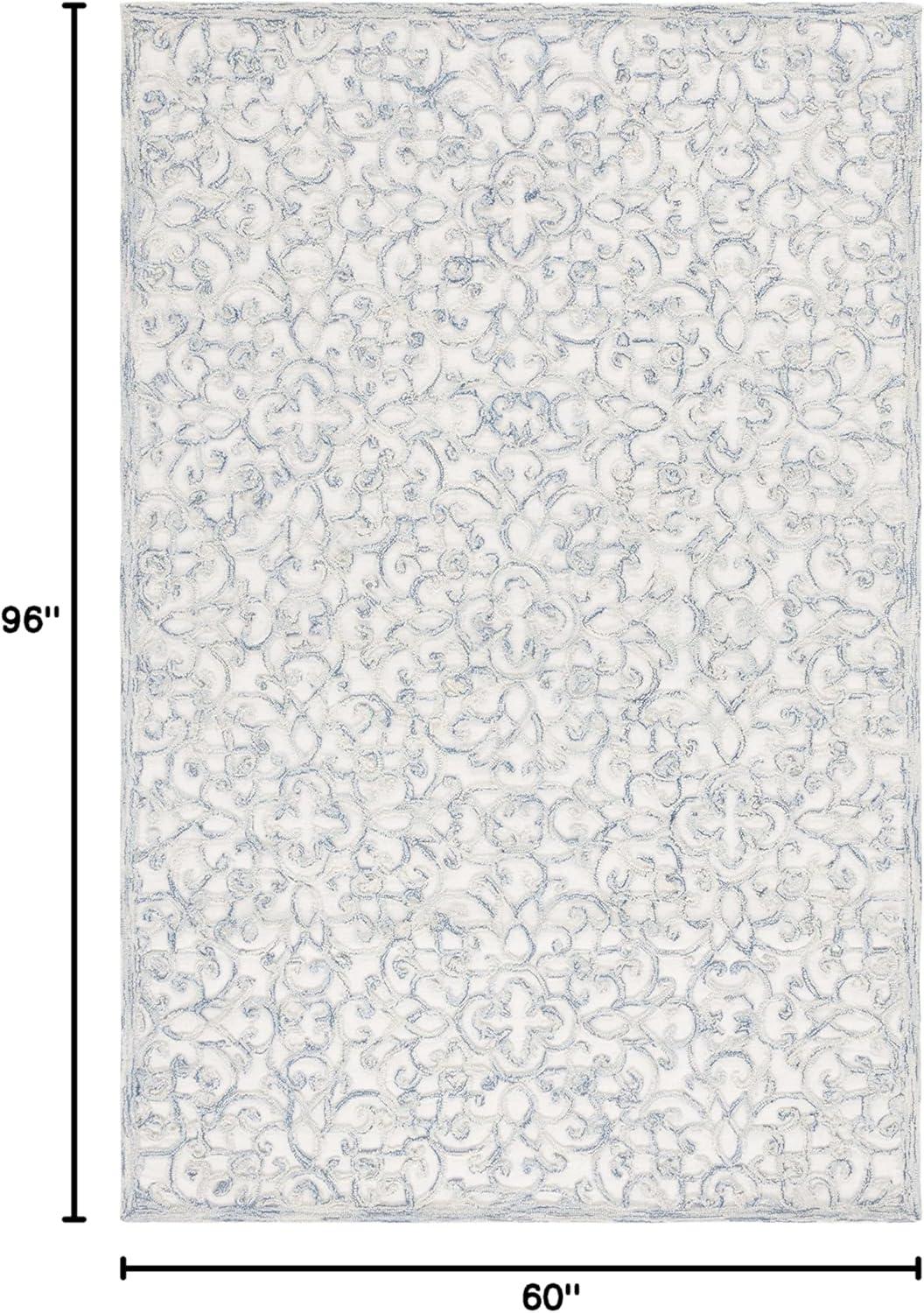 Trace TRC103 Hand Tufted Indoor Area Rug - Blue/Ivory - 5'x8' - Safavieh.