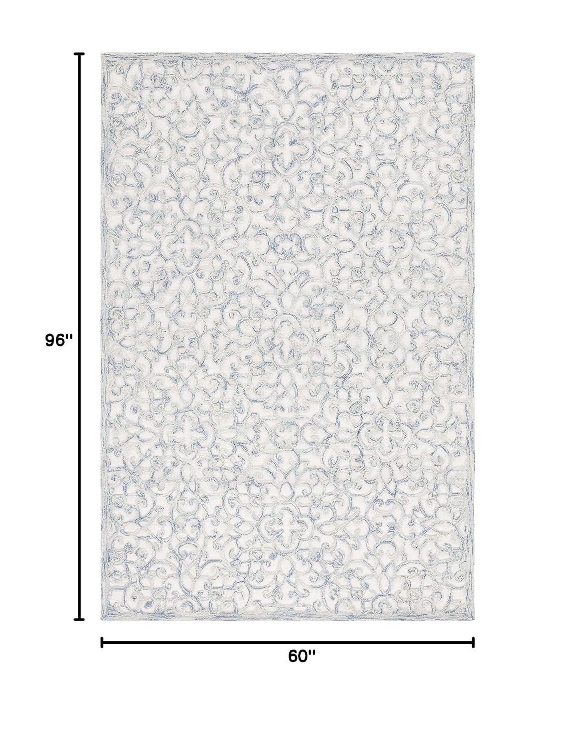 Trace TRC103 Hand Tufted Indoor Area Rug - Blue/Ivory - 5'x8' - Safavieh.