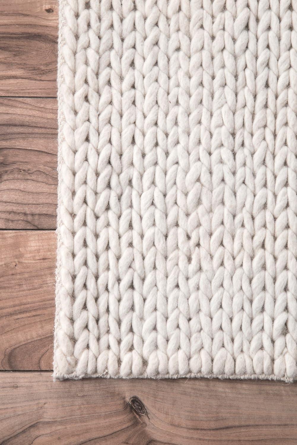 Handmade Off White Wool Oval Braided Rug 10' x 14'