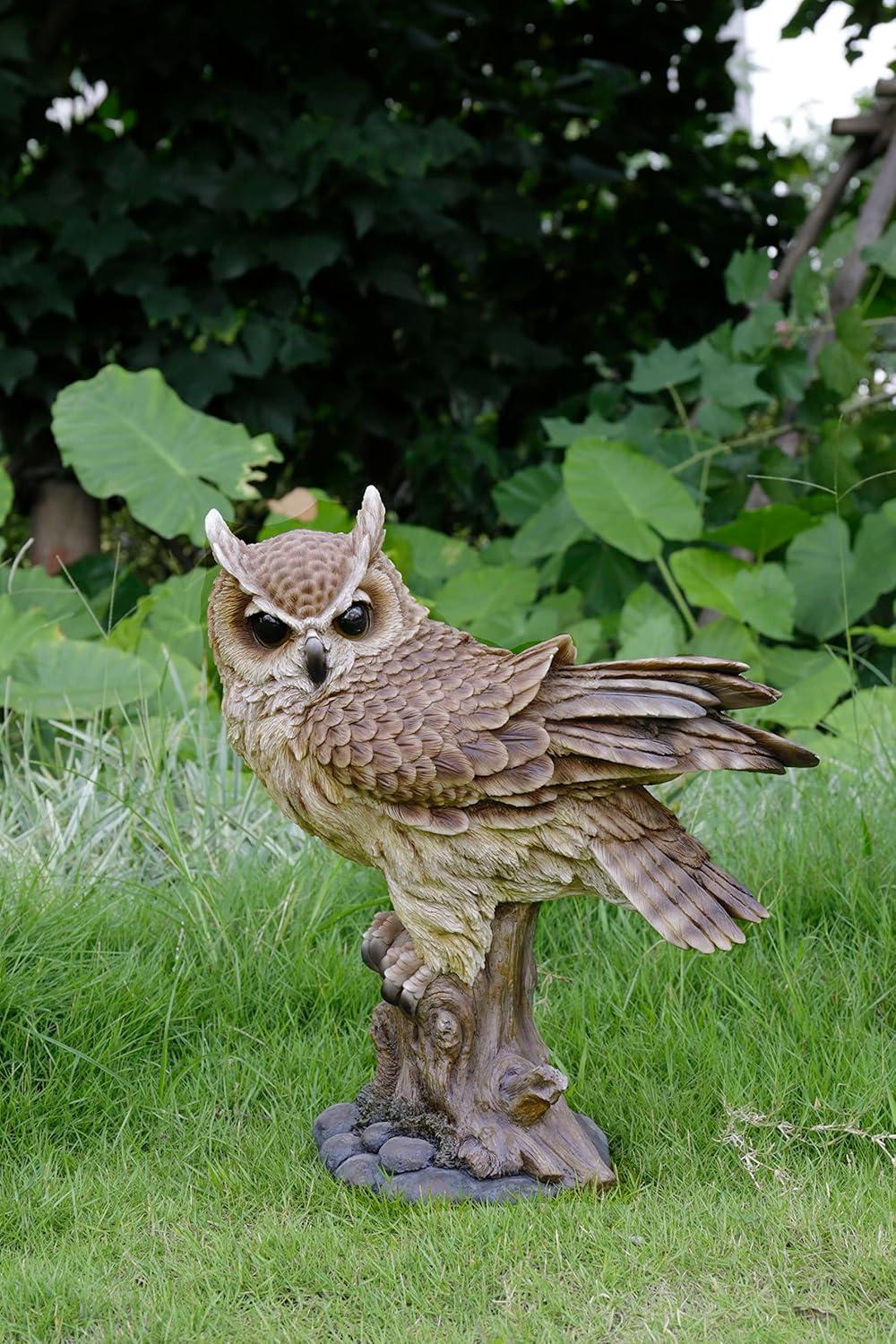 LARGE LONG EARED OWL ON STUMP WITH FLUFFED FEATHERS