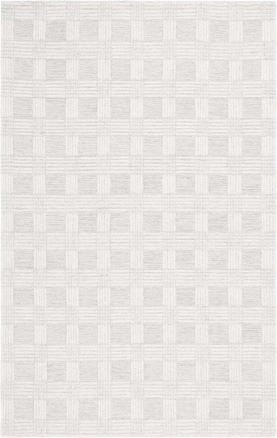 Ivory Hand Tufted Wool Rectangular 6' x 9' Area Rug