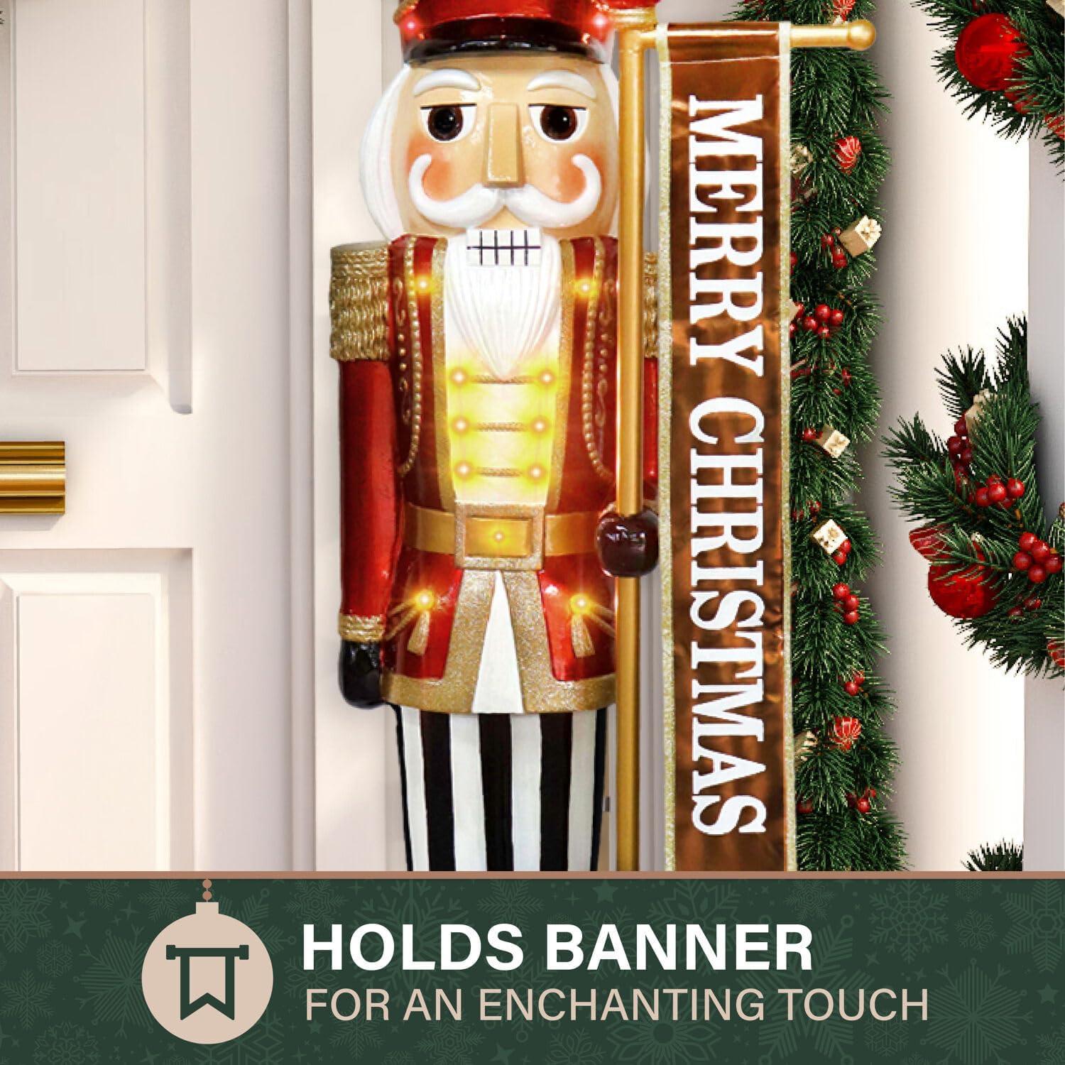 Fraser Hill Farm 4-Ft. Metallic Nutcracker Holding Banner Statue with LED Lights