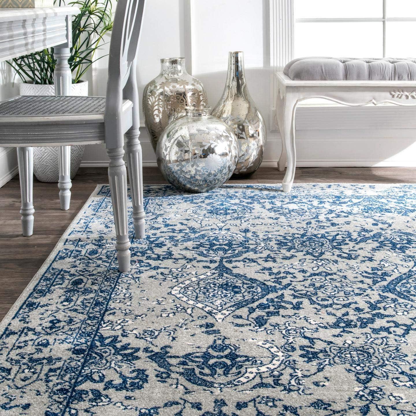 Odell Light Blue Floral Synthetic 5' x 7' Area Rug