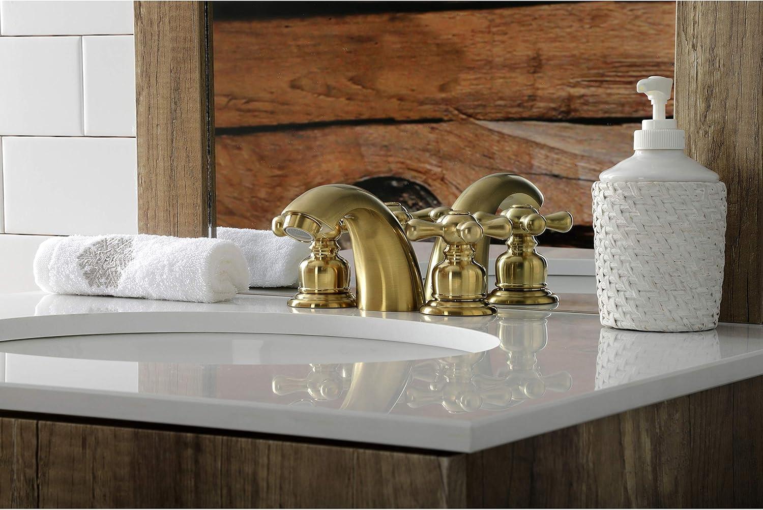 Kingston Brass Victorian Two-Handle 3-Hole Deck Mount Mini-Widespread Bathroom Faucet with Plastic Pop-Up