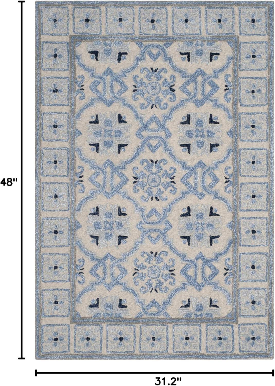 Handmade Ivory and Blue Wool Viscose Tufted Area Rug