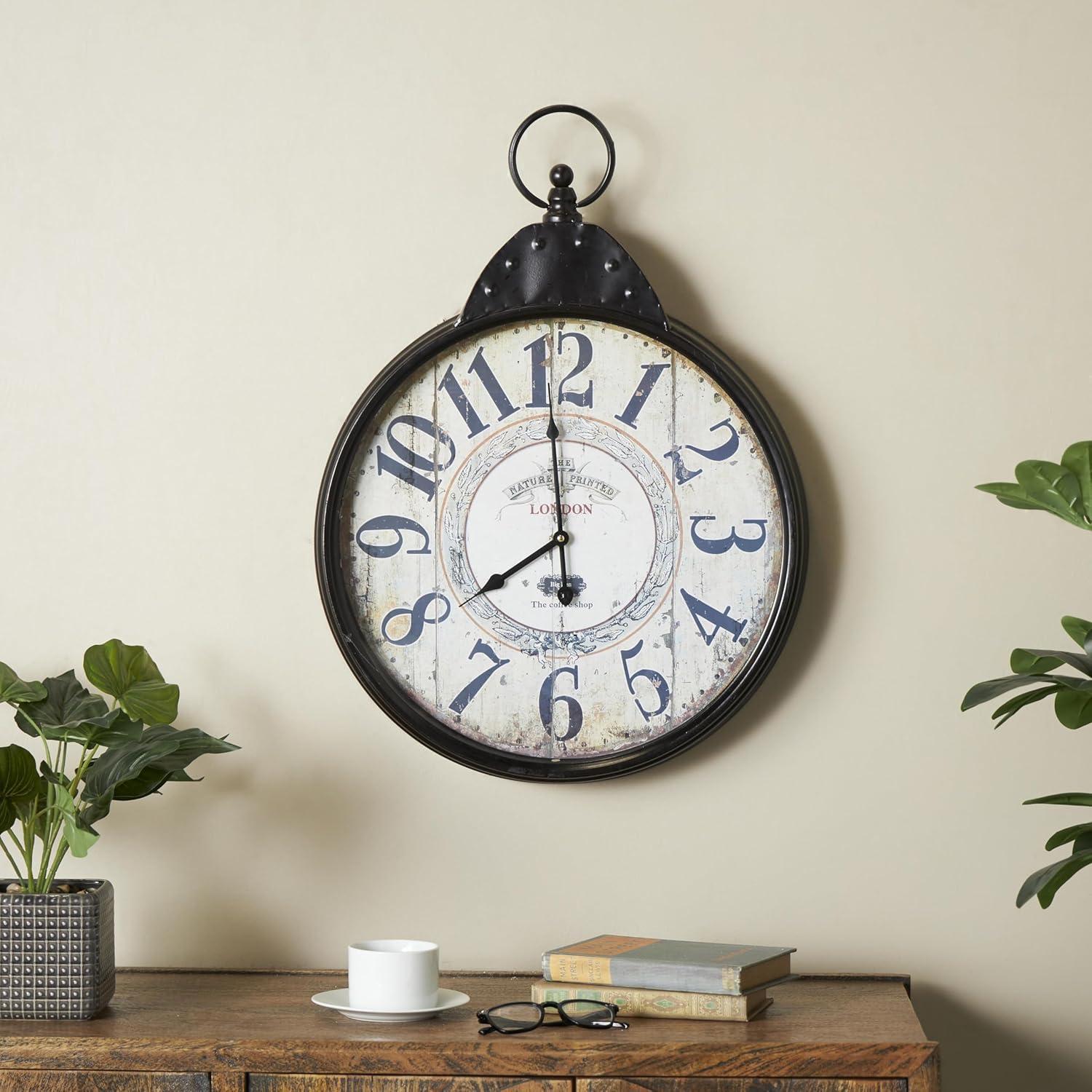 DecMode 20" Black Metal Finial Distressed Pocket Watch Inspired Wall Clock with Beige Clockface
