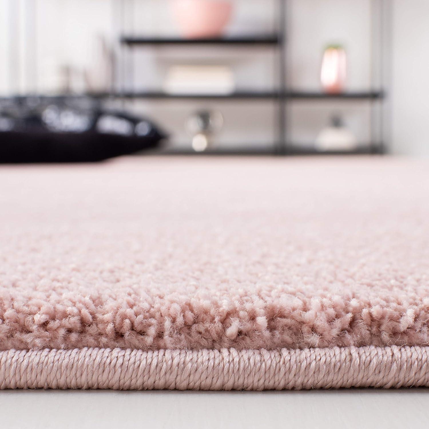 SAFAVIEH Plain and Solid Carleen Solid Plush Area Rug, Pink, 5'5" x 7'7"