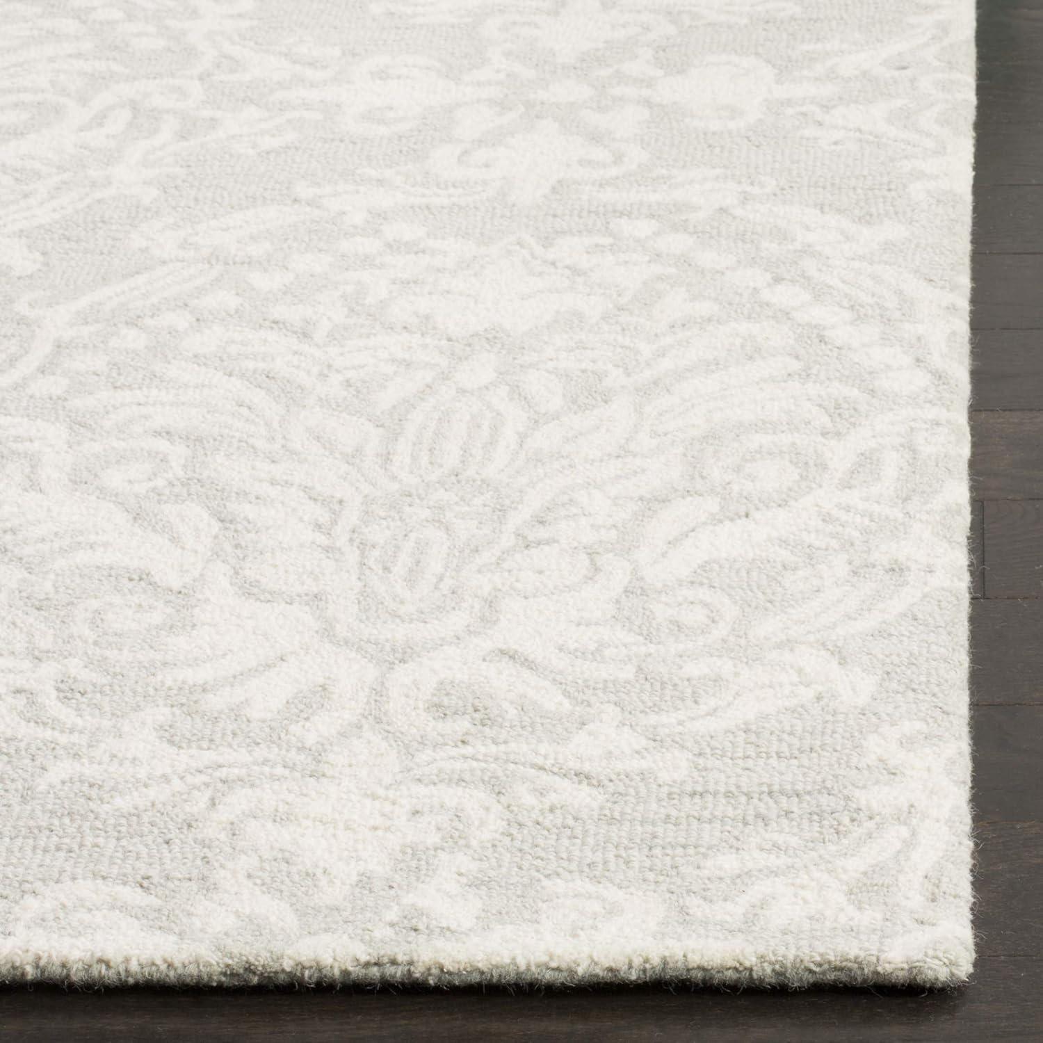 Handmade Floral Bliss Blue/Ivory Wool 5' x 8' Tufted Area Rug