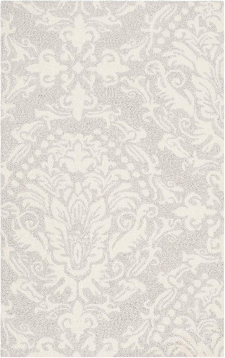 Handmade Floral Bliss Blue/Ivory Wool 5' x 8' Tufted Area Rug