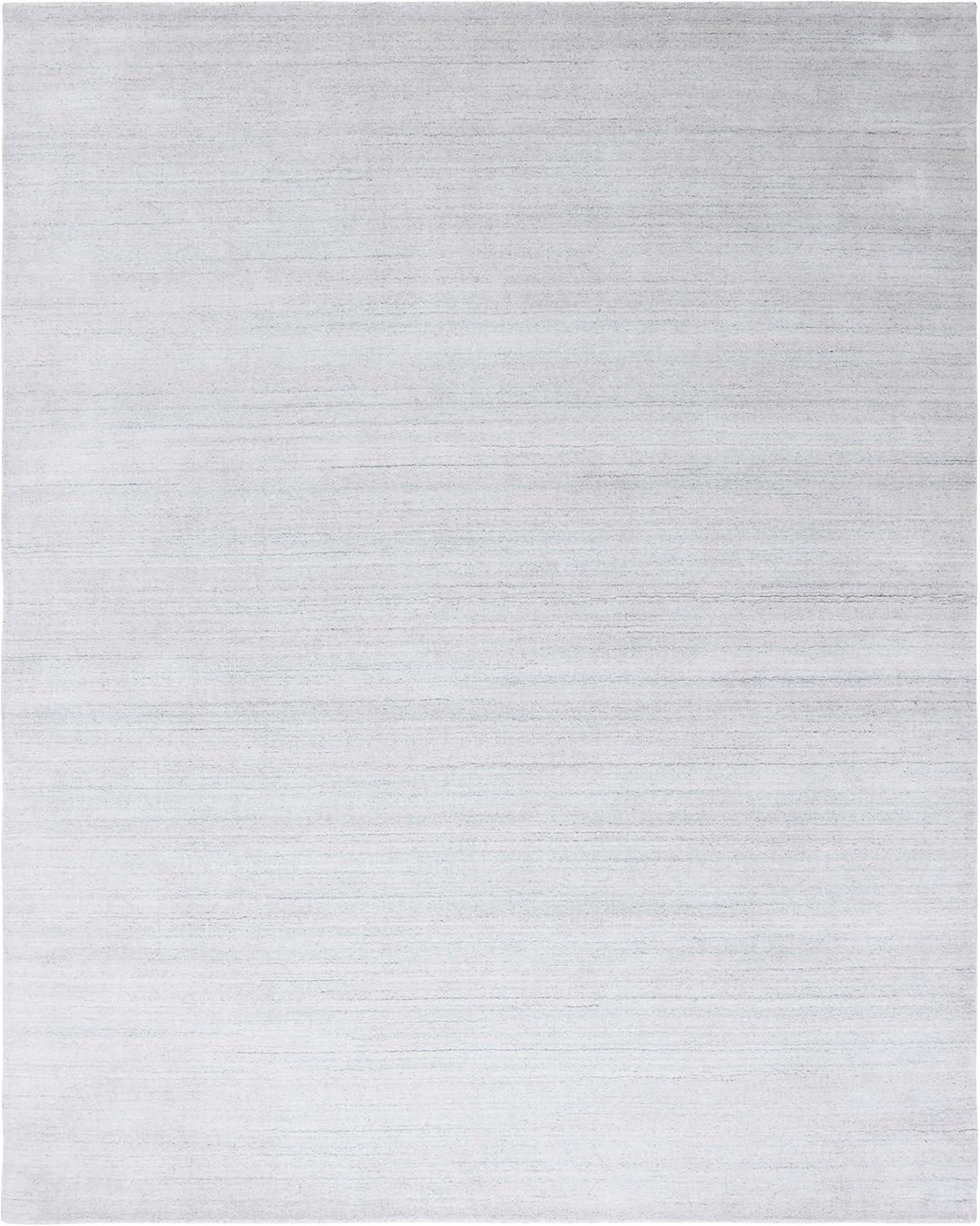 SAFAVIEH Mirage Branislav Solid Area Rug, Silver, 9' x 12'