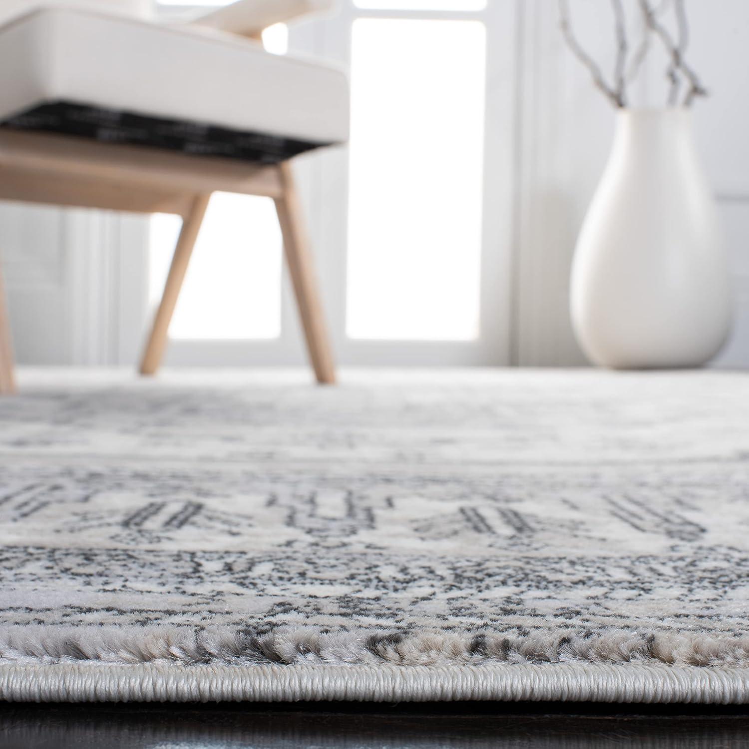 Carnegie CNG662 Power Loomed Area Rug - Ivory/Grey - 8'x10' - Safavieh.