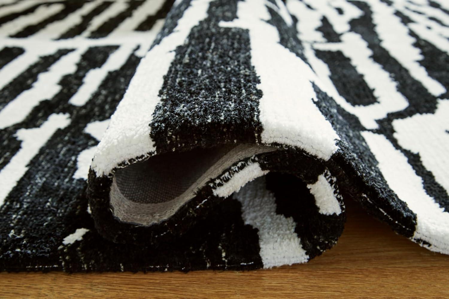 Black and White Abstract 5' x 7' Synthetic Rug