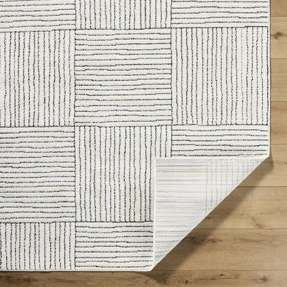 Ivory and Black Geometric Patterned Synthetic Area Rug, 5' x 7'