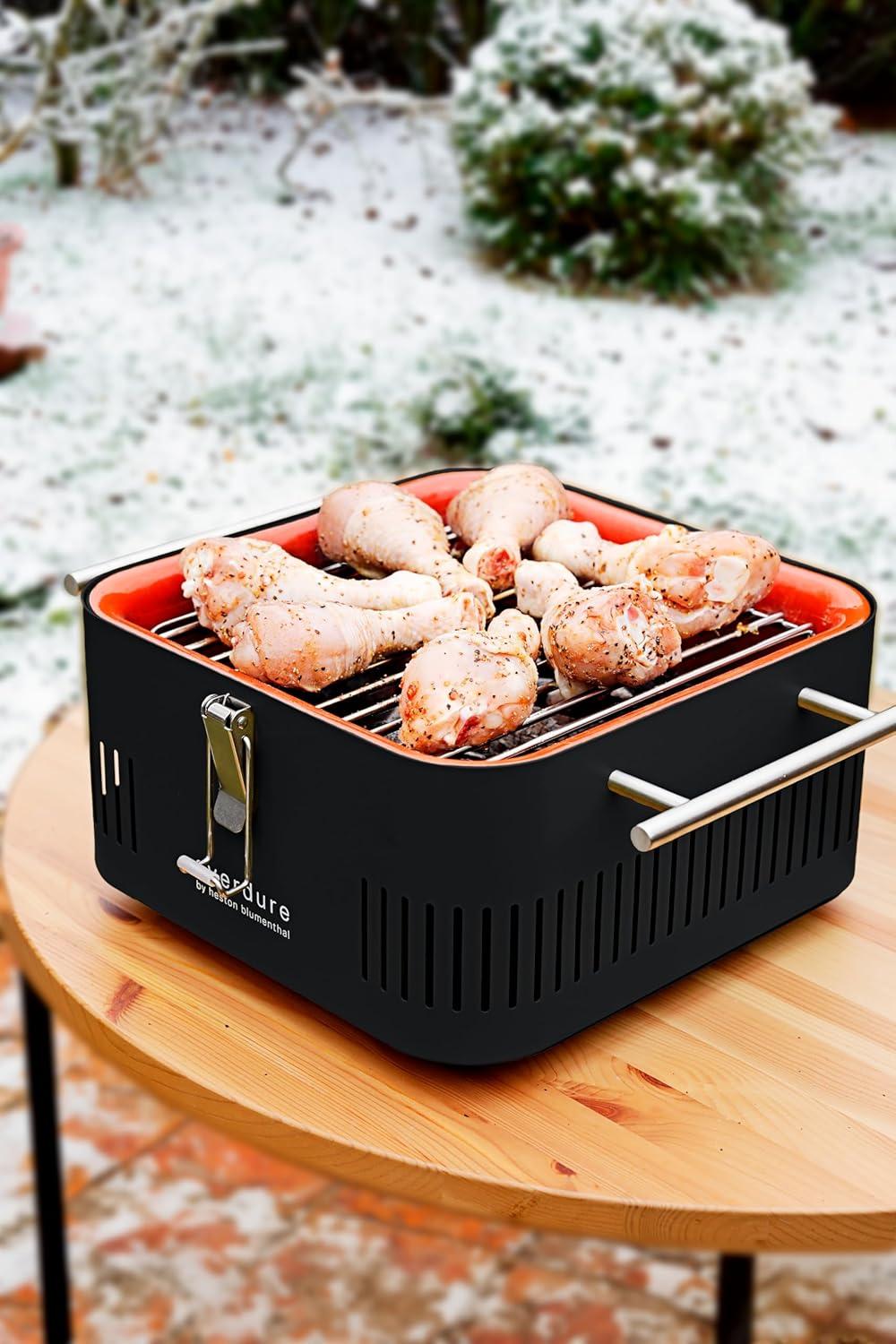 Compact Matte Black Charcoal Grill with Bamboo Preparation Board