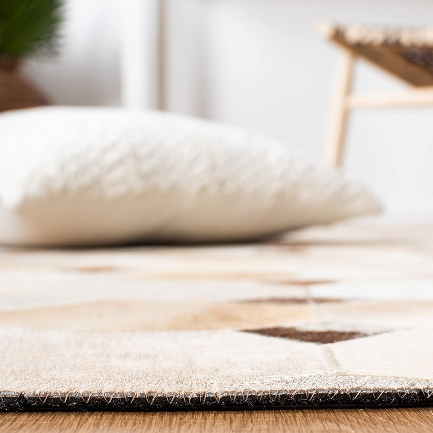 Loon Peak® Bersa Flat Weave Hair On Leather Geometric Rug