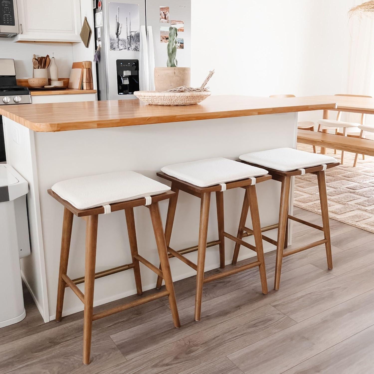 Nathan James Barker Counter Height Barstool: Padded Saddle Seat, Solid Rubberwood Legs, 24" Tall