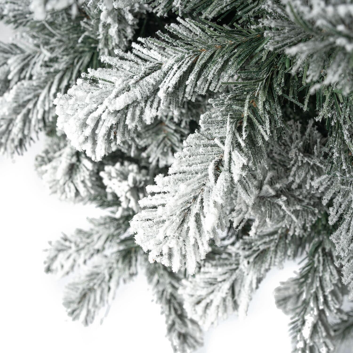 Salzburg 7.5ft Frosted Prelit Slim Artificial Christmas Tree with 1102 Branch Tips, 350 Warm Lights and Metal Stand, 34" wide Realistic Snow Flocked Skinny Pencil Christmas Tree by Naomi Home