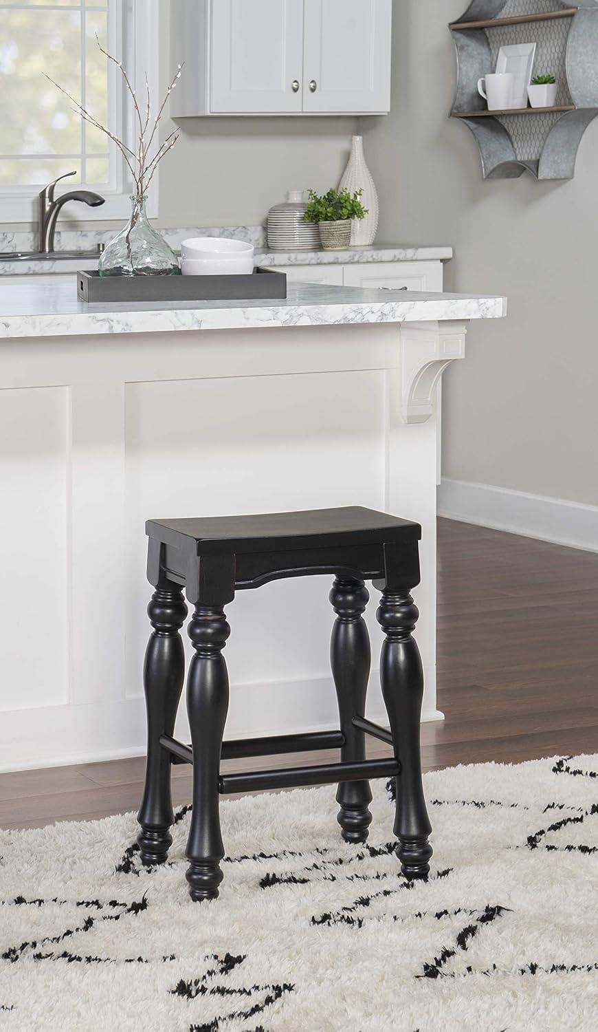 Clemmer Distressed Black Solid Wood Saddle Counter Stool