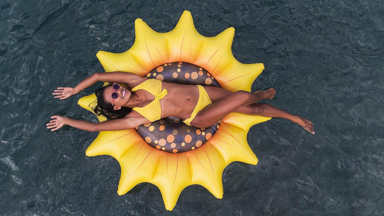 Get Ready for Summer Fun with PoolCandy's Inflatable Sunflower Island Pool Float - Perfect for Parties and Relaxation. The Ultimate Swimming Pool Inflatable Toy.