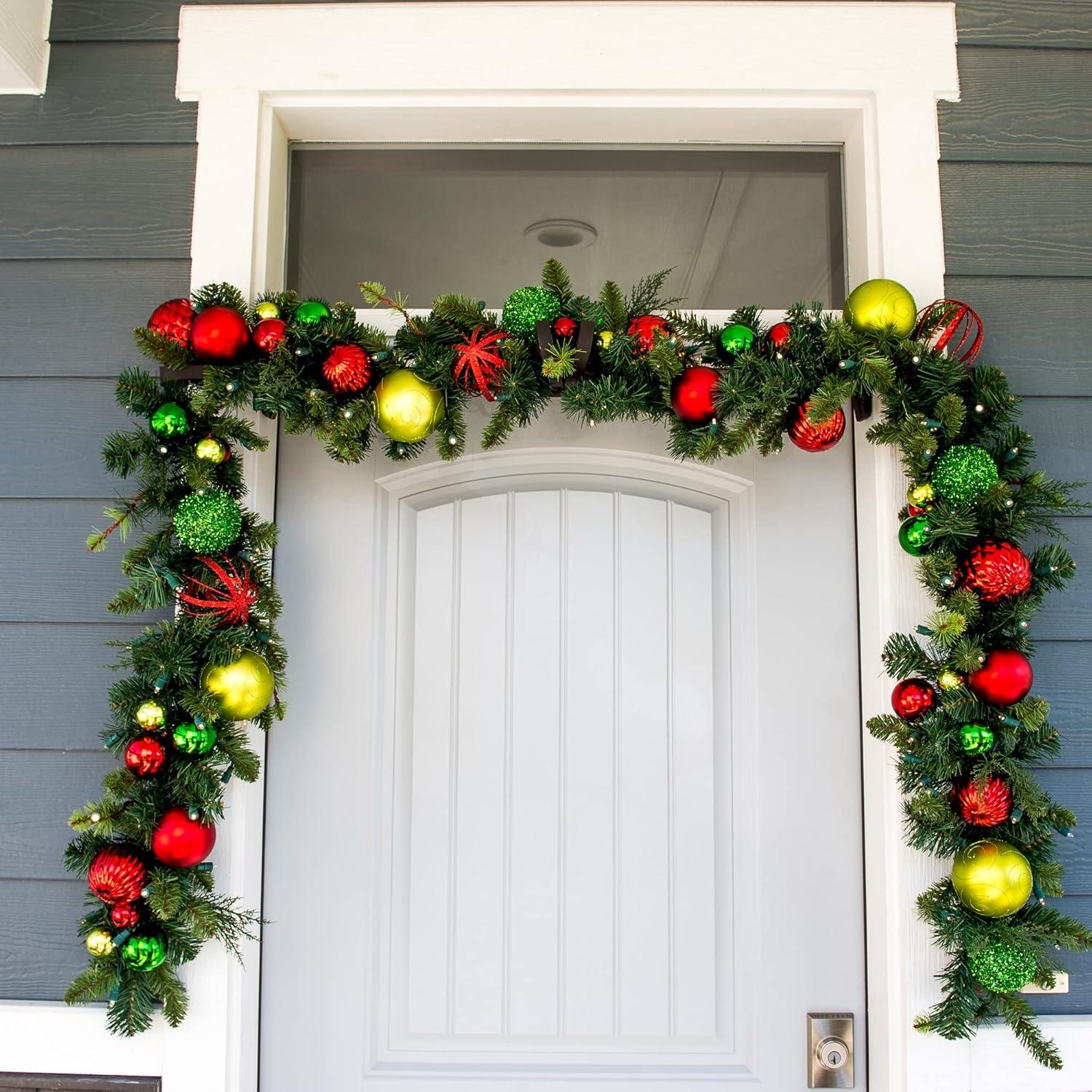 [9 Foot Artificial Christmas Garland] - Festive Holiday Collection - Red and Green Decoration - Pre Lit with 100 Warm Clear Colored LED Mini Lights - includes Remote Controlled Battery Powered Timer