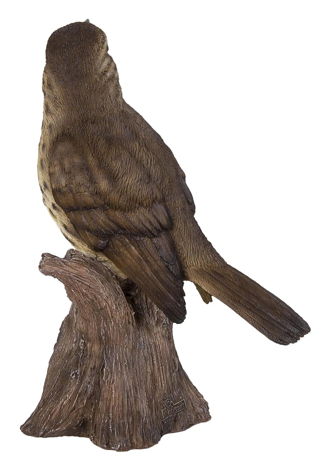 Songbird Standing on Stump Statue