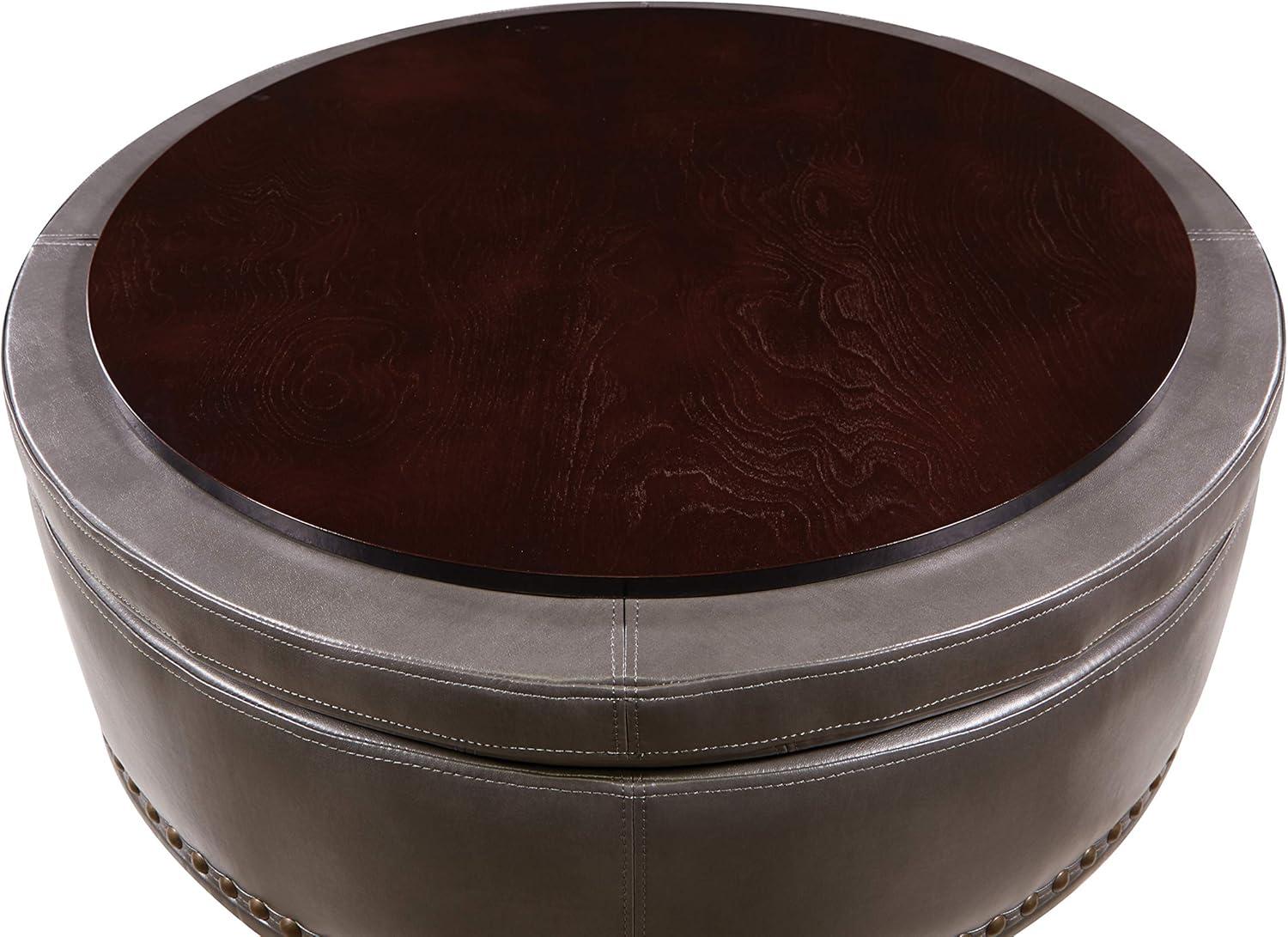 OSP Home Furnishings Augusta Round Storage Ottoman in Pewter Bonded Leather with decorative nailheads