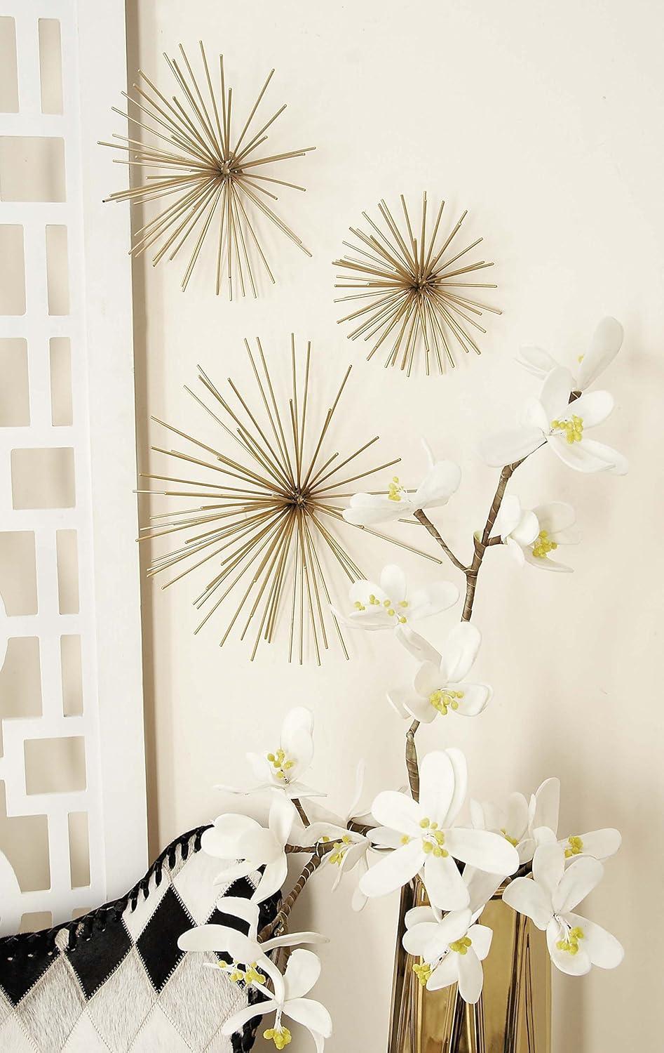 CosmoLiving by Cosmopolitan Gold Metal Starburst 3D Short Spike Home Wall Decor, Set of 3 6", 9", 12"W