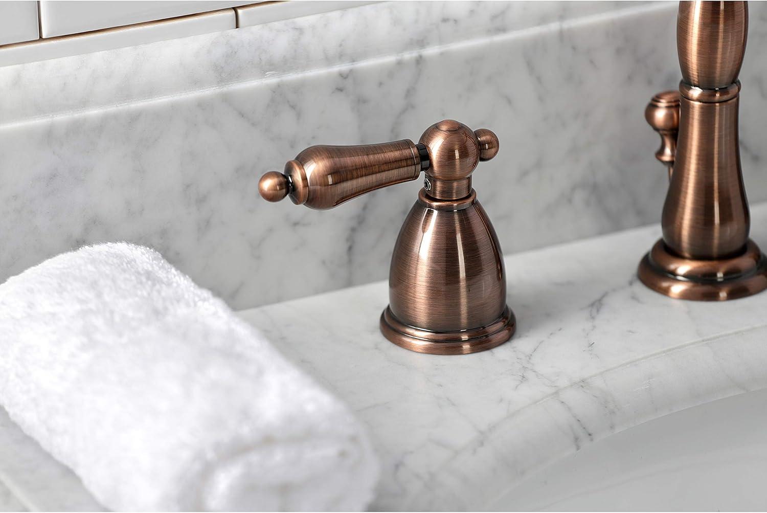 Kingston Brass Heritage Two-Handle 3-Hole Deck Mount Widespread Bathroom Faucet with Brass Pop-Up Drain