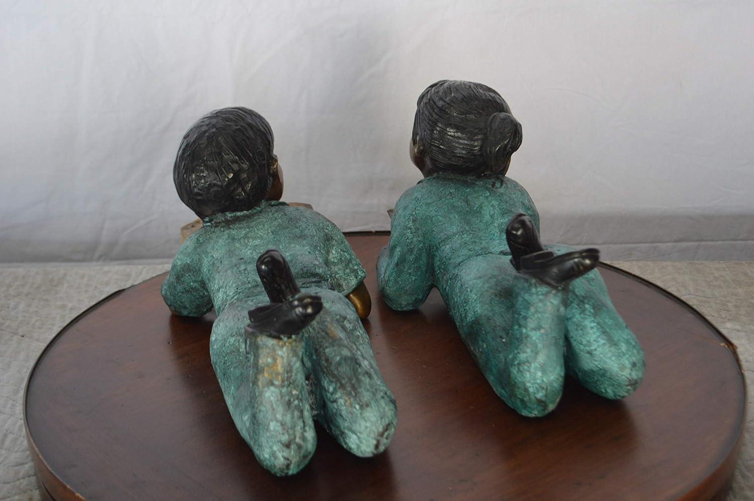 Set of a Boy and a Girl Reading a Book Bronze Statue - Size: 16"L x 7"W x 8"H.