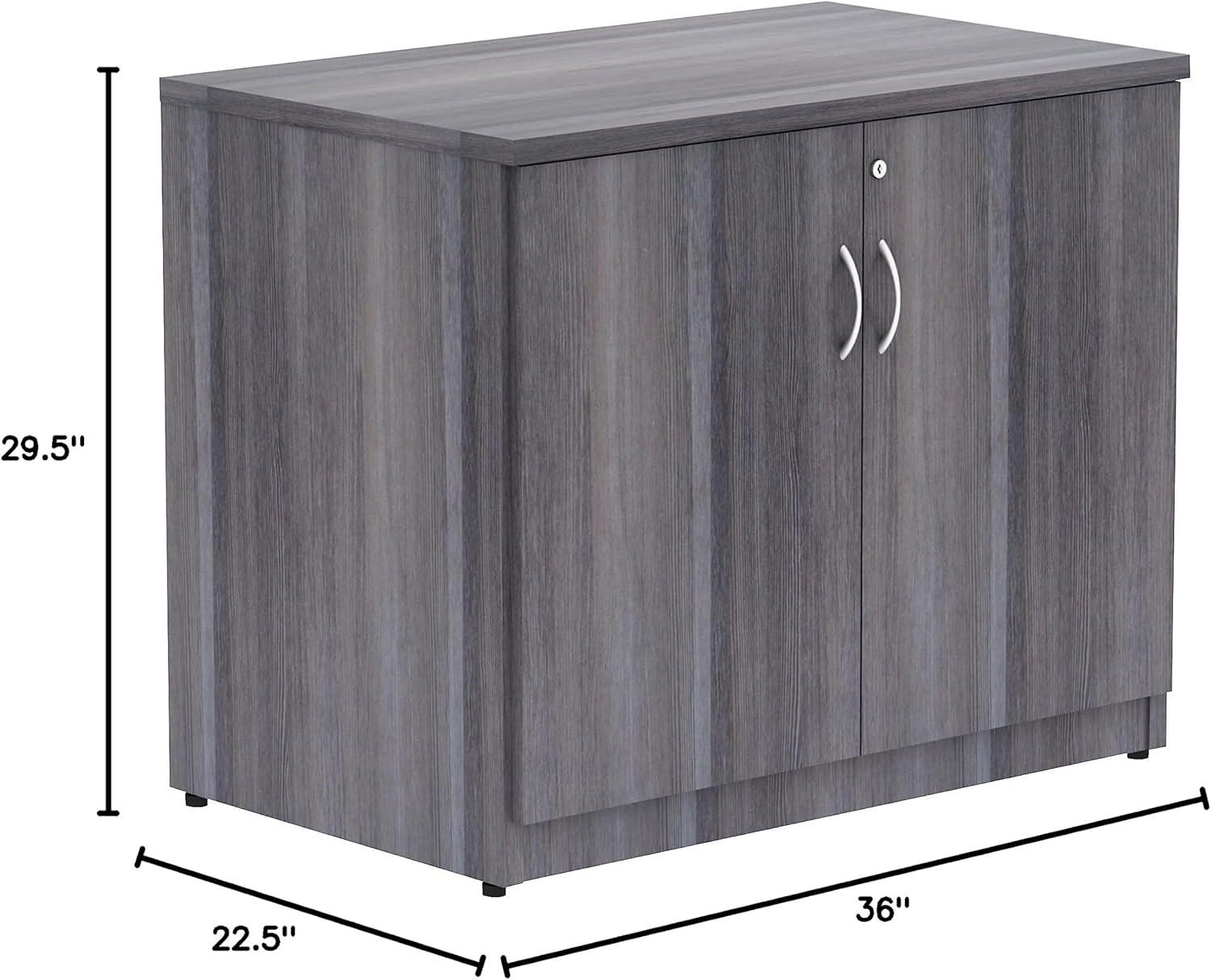 Essentials Series 2-Door Storage Cabinet - 36" X 22.5" X 29.5" - Drawer(S)2 Door(S) - Material: Melamine Faced Chipboard (MFC) Top, Melamine Faced Chipboard (MFC) Shelf, Melamine Faced Chipboard (MFC) Side Panel, Melamine Panel - Finish: Weathered Charcoa